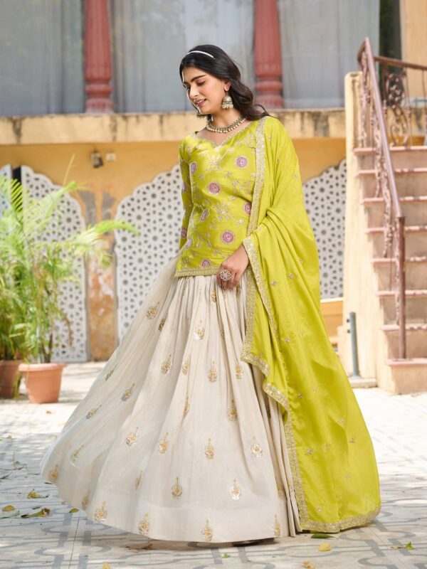 ivory silk lehenga with embroidered kurta & dupatta