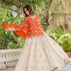 ivory silk lehenga with embroidered kurta & dupatta